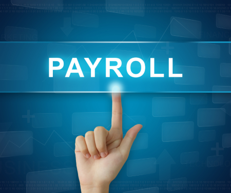 Hand pointing to the word payroll
