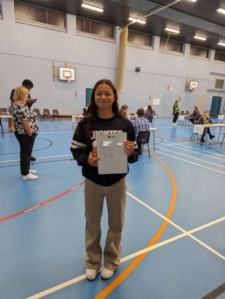 Student with her GCSE results