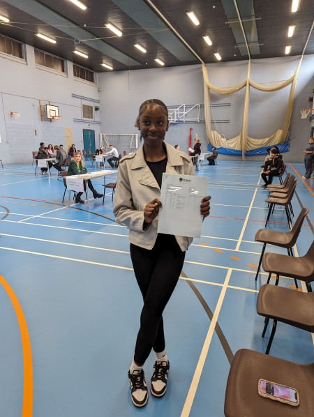 Student with GCSE results