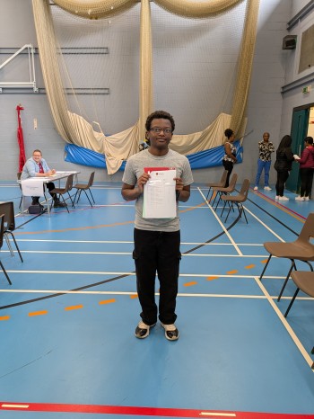 Student with GCSE results