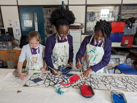 Students painting panels