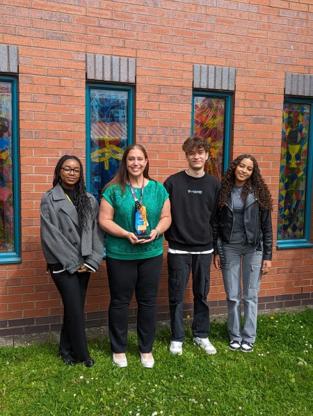 Ms Markatos with Sixth Form students