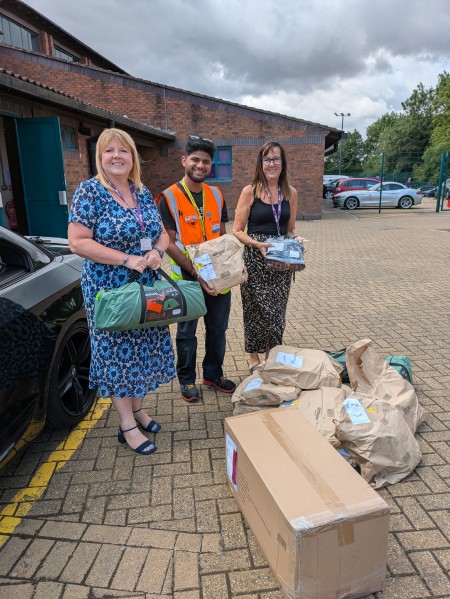 Mrs Hoarty and Mrs Parkins receive the Amazon donation