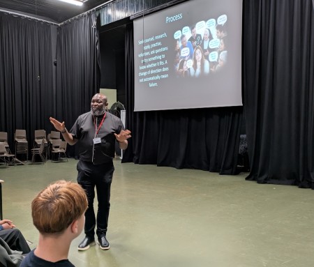 Fr Emmanuel talks to students