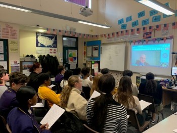 Students with Lord Haskel on screen