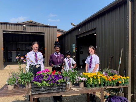 Students with flowers
