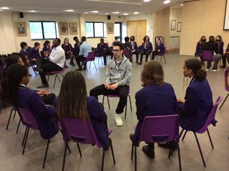 Alumni talking to current students