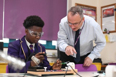 D & T Teacher with students